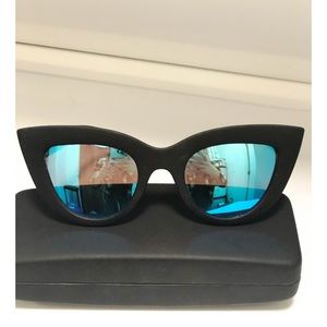 Black cat-eye Quay sunglasses